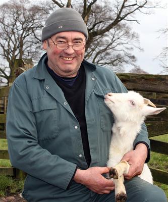 Stephen Akrigg with one of his goats