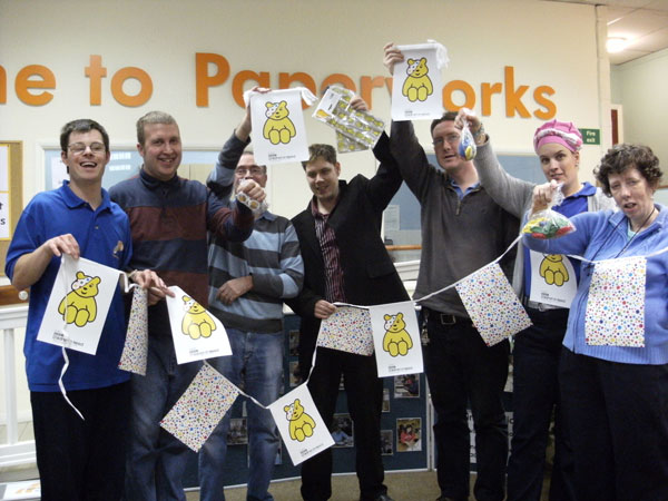 Trainees celebrate the completion of a high profile contract for BBC Children in Need last year.