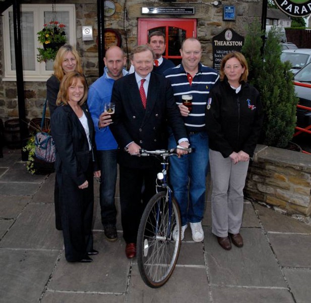 Picture Caption: Pedal for Pounds! T&R Theakston Ltd Executive Director Simon Theakston (third from right) with (from left) Diane Armstrong from Alzheimer’s Society, Diane Walker from Great North Air Ambulance, Kris Stephenson, James Lawrie from Macmillan Cancer Support, Chris Wade and Sally Mendonca from Help for Heroes