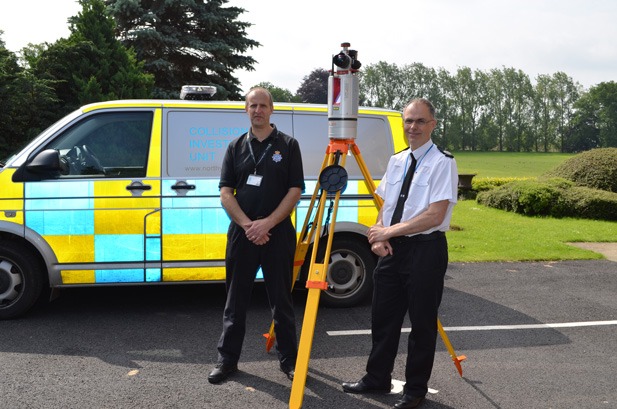 Acting Sergeant Dave Foster and Assistant Chief Constable Iain Spittal with the scanner