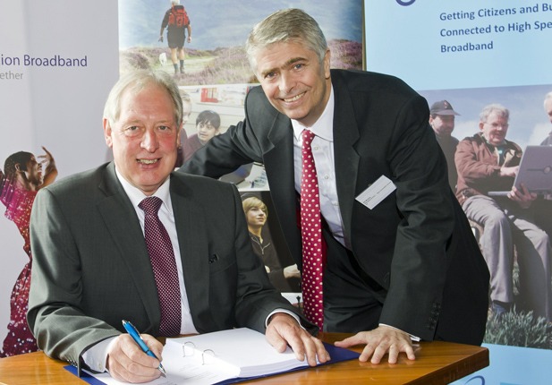 John Moore (left), Corporate Director, Finance and Central Services, North Yorkshire County Council, and Bill Murphy, Managing Director, Next Generation Access, BT, signing the Connecting North Yorkshire contract