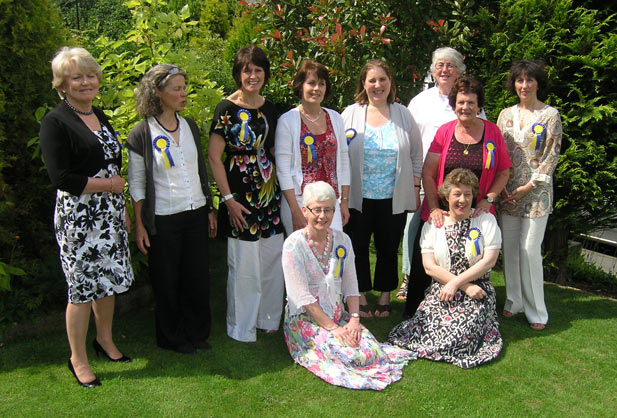 · Pictured marking the century of caring are (back row, from left) Frances Williams (14 years’ service), Sue Clements (12), Stella Elson (11), Heather Smith (10), Rachel Waddington (11), Anne Smyth (20), Jill Smith (14) and Nina Derbyshire (11). Kneeling (from left) are Sheila Constable (12) and Catherine Thompson (10)