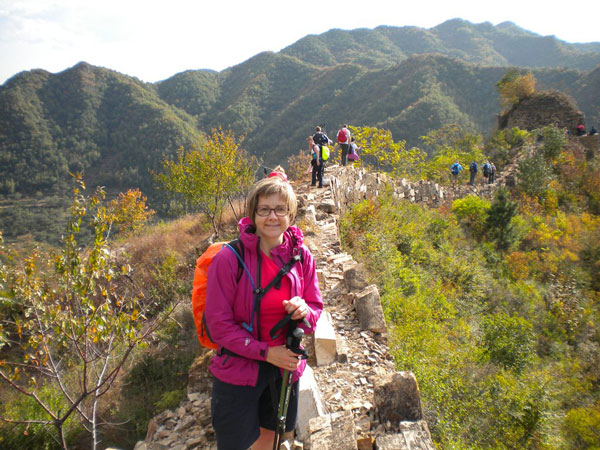 Hitting the wall: Sarah takes a well-earned break from her Great Wall of China trek