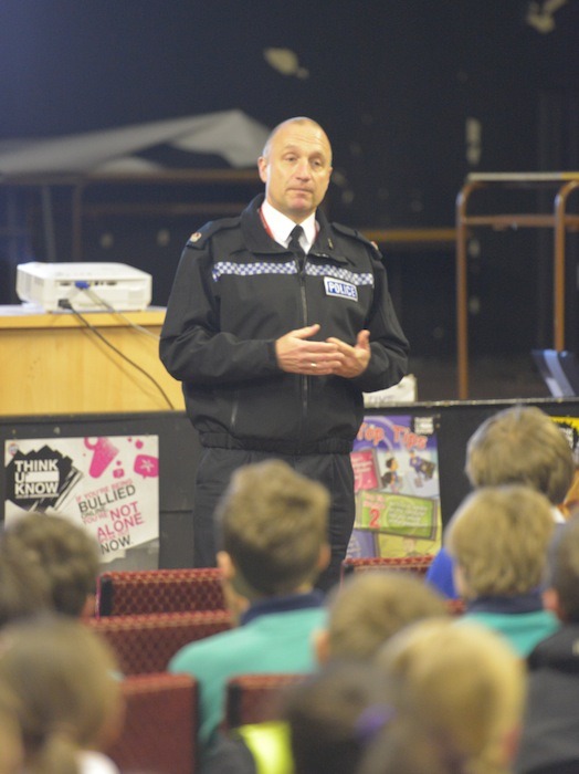 Harrogate District Commander, Aubrey Smith talks to the children