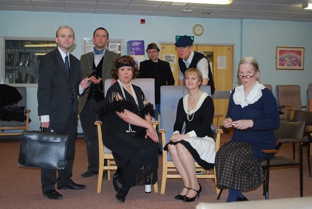  Members of the cast in costume during some of the final rehearsals