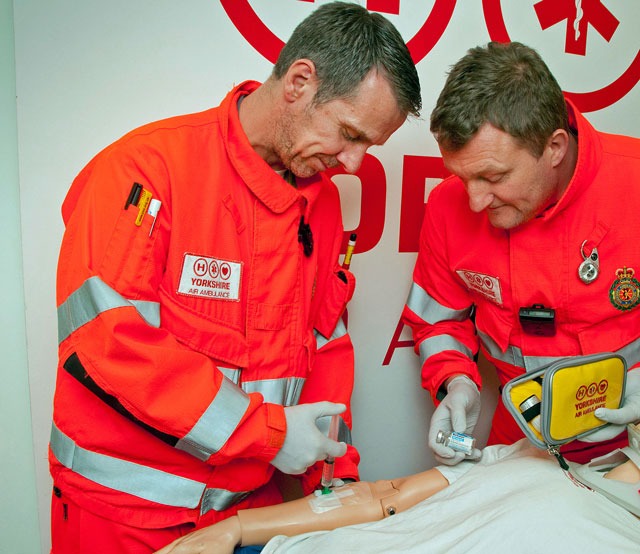 Yorkshire Air Ambulance paramedics Darrel Cullen and Lee Davison practice administering ketamine on a training mannequin