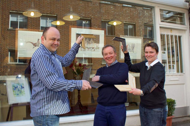 In The Frame! Frames n’ Things owners, Nick Allan (centre) with Darren Schofield and Fiona Kells