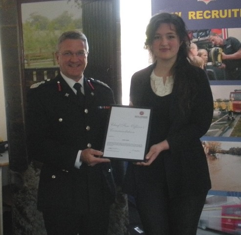  Chief Fire Officer Nigel Hutchinson and Leah Curtis with her Commendation Certificate