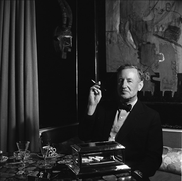 Ian Fleming at Table Reproduced with Permission from Ian Fleming Publications Ltd