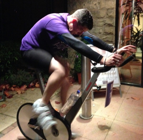 Spinning for Saint Michael’s Hospice! The Academy Customer Ambassador Chris Mason takes part in the spinning challenge