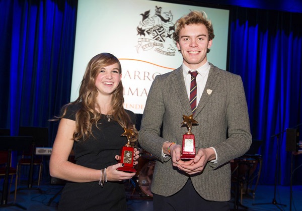 Head Girl, Ellie Rymer and Head Boy, Toby Hall collecting their awards