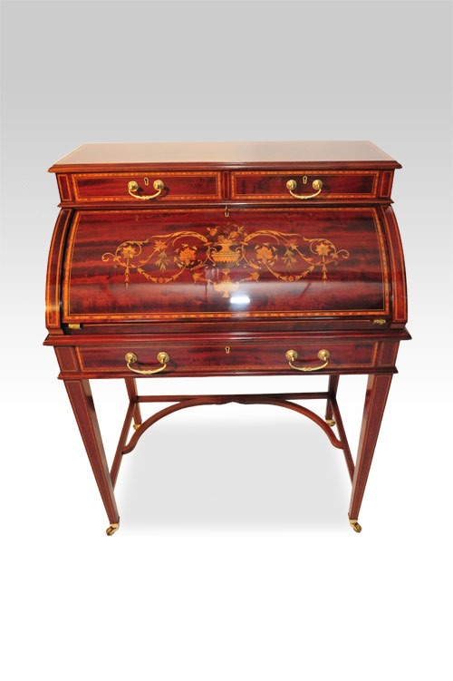 Mark Buckley Antiques will bring along a stunning quality, late Victorian mahogany inlaid, cylinder desk by Maple & Co which will cost £3995