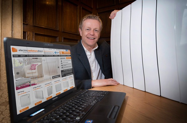 Eco Stores Direct founder Paul Walker with one of the firm’s energy efficient electric radiators