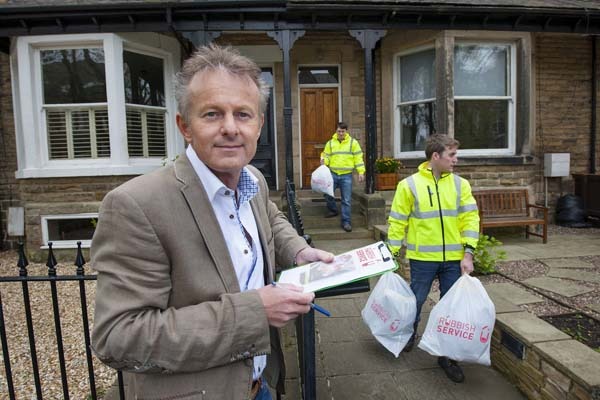 Founder of the service, Andrew Brown, with two Rubbish Service operatives