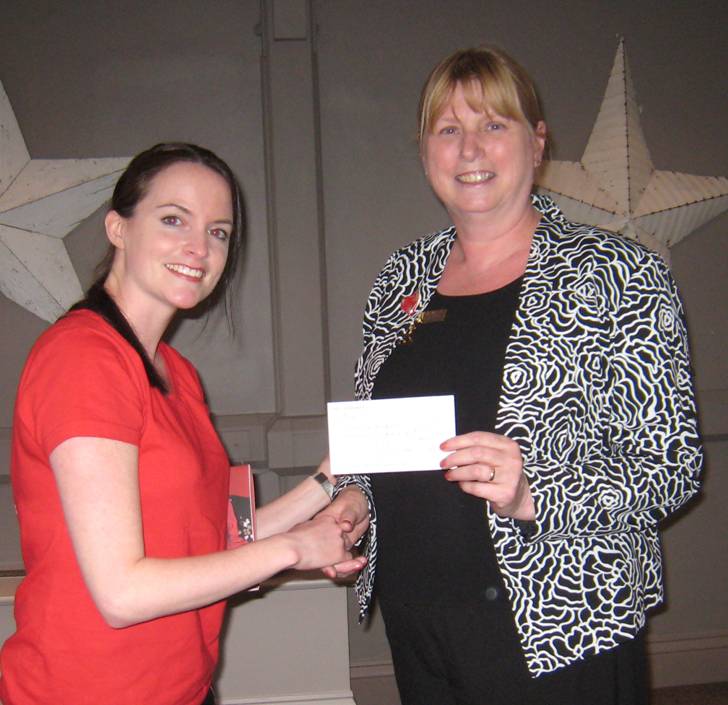 Sharon Oakley, BHF Fundraising Manager for Harrogate, receives a cheque from outgoing President Gillian Trotter