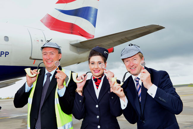 Outside on the runway: Launching their own world record “selfie” are: (left-right): Tony Hallwood, Leeds Bradford Airport aviation development and marketing director, Lucy Jayne Pattinson, British Airways’ customer service agent and Jim Keegan, British Airways’ regional customer service manager UK regions & Ireland