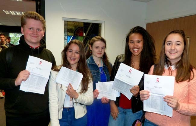 Sam Gibson, Samantha Lindsay, Lauren Dolman, Olivia Niles and Samantha Moody celebrate after picking up their GCSE results at Rossett School