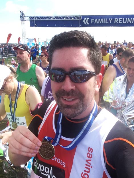Luke-O’Connor-from-‘Team-Red-Cross-Yorkshire’-completed-the-Great-North-Run-on-7-September-2014-with-finishers'-medal