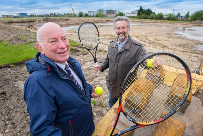 (L to R) are head of Barber Titleys property department, Richard Davis, a partner, with Nigel Bentley of Harrogate Spa Tennis Centre. Work on Phase One of the centre is in progress in the background