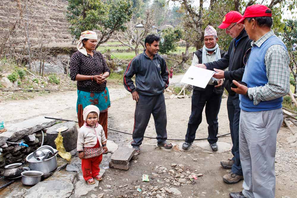 Rotarians Barry Pollard (Harrogate Brigantes) and Major Lil Gurung MBE (Himalayan Gurkhas) meet shop owner Shanti Adhikari, one of the micro loan recipients