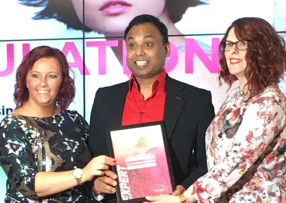 Shane Singh receiving his Master Colour Expert certificate from Wella