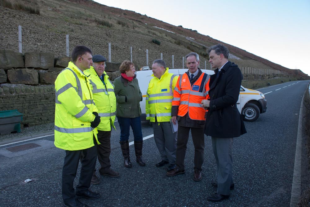 At the site of the A59 closure are (from left) Barrie Mason, the County Council’s Assistant Director for Highways; County Councillor John Fort, member for Pateley Bridge division; Harrogate Borough Councillor Christine Ryder, member for the Washburn ward; James Malcolm, County Council Area Highways Manager; County Councillor Don Mackenzie, Executive Member for Highways; and Julian Smith, MP for Skipton and Ripon