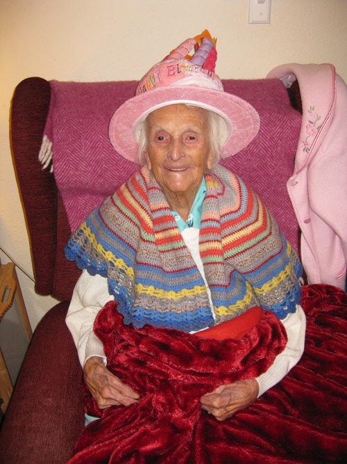 Violet-in-her-birthday-hat-on-her-105th-Birthday-at-Emmaus-House