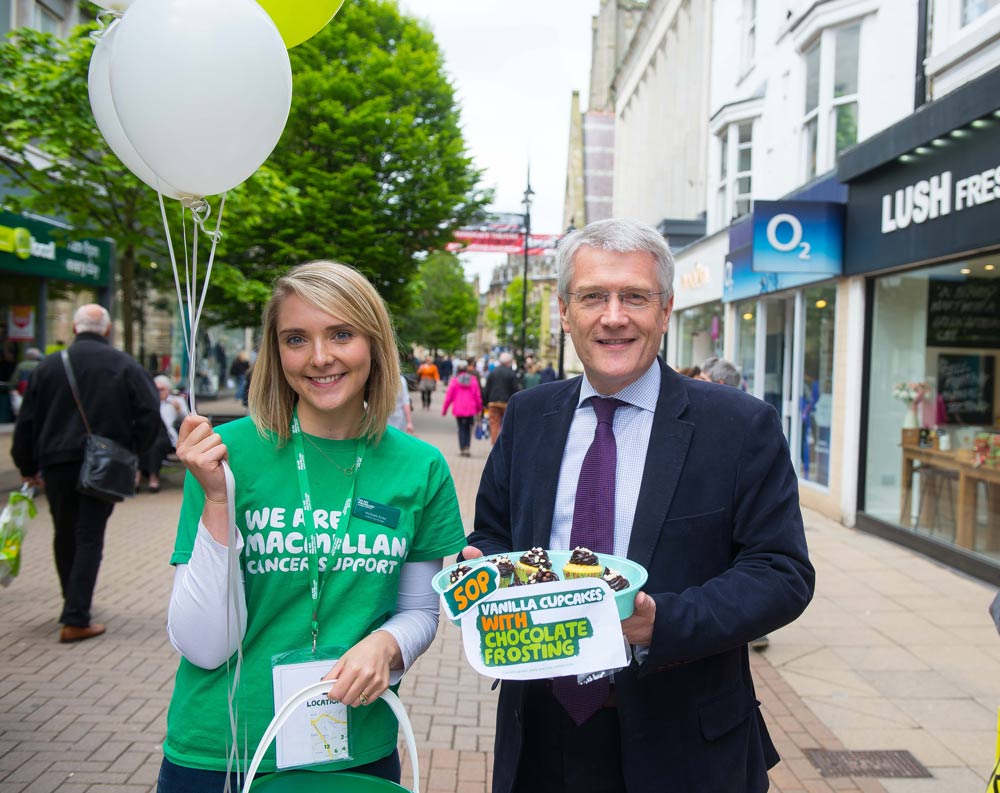 Michaela Ryder of Macmillans with Andrew Jones MP