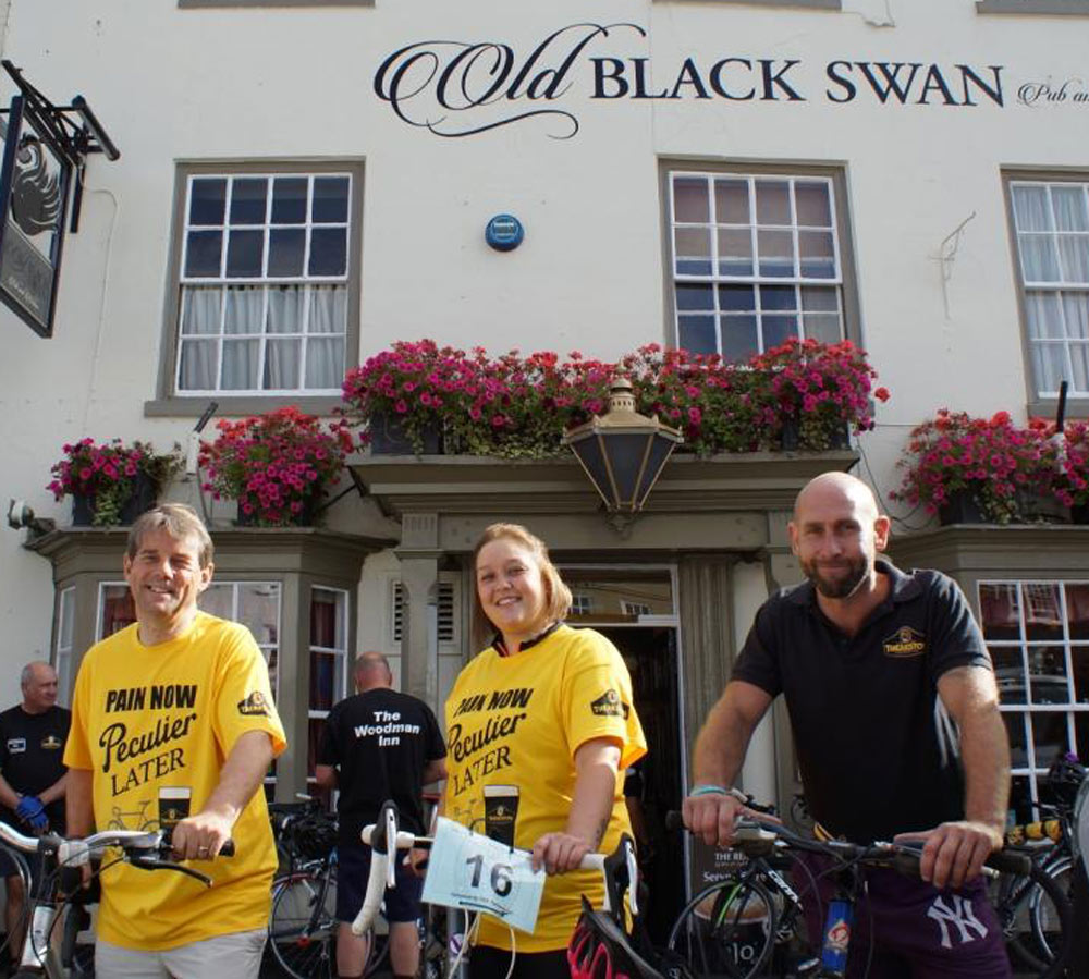 Under Starters Order! T&R Theakston Ltd’s Sales Development Manager Barry Gibb (left) with Megan Ineson, the manageress of the Old Black Swan, and Kris Stephenson, who helped organise the event