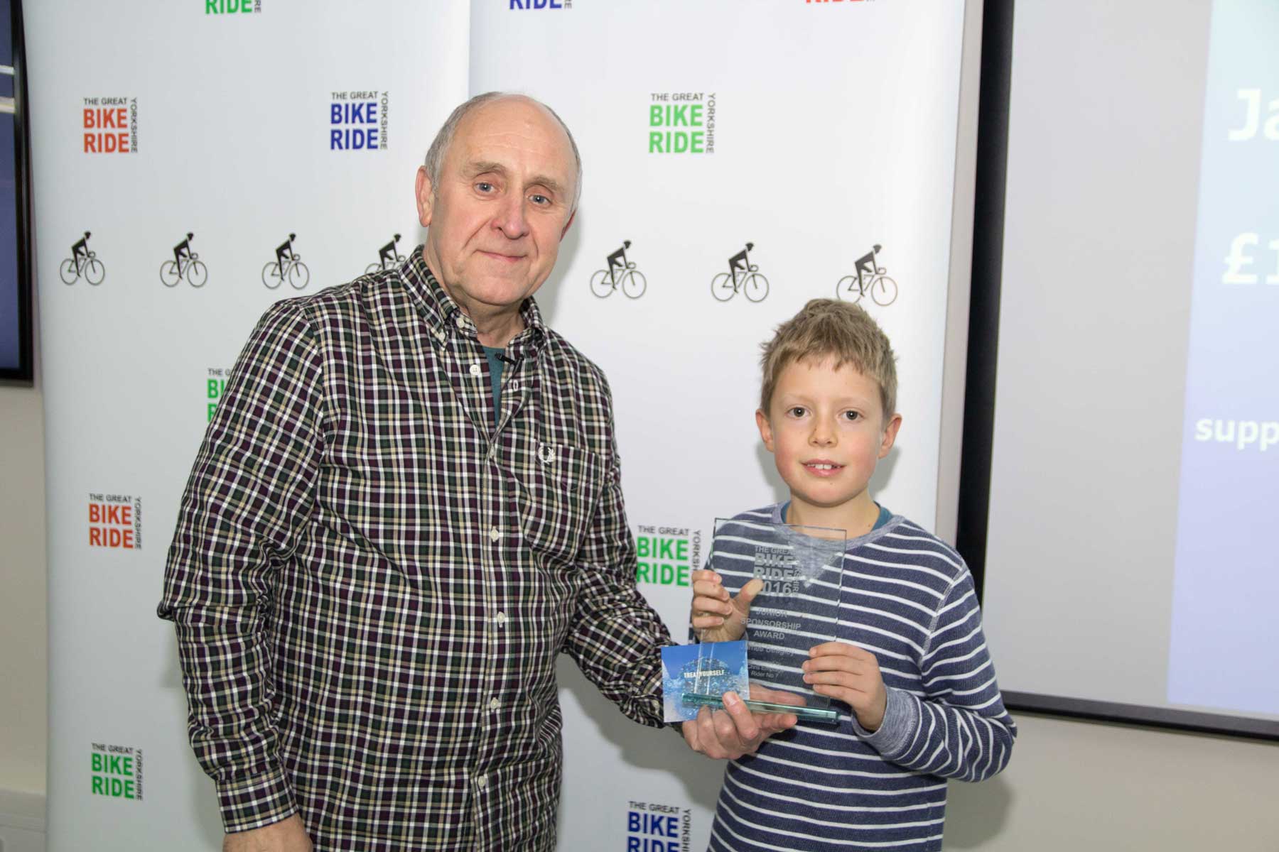 ames Beagley is presented with his award by event organiser John Taylorson MBE