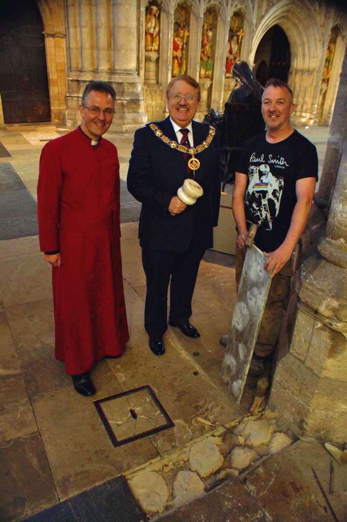 Freemasons Rt W Bro David S Pratt (centre), W Bro Paul Clarke (left) and W Bro Jack Pigott (right) present the cheques to the Dean of Ripon Cathedral, The Very Rev John Dobson
