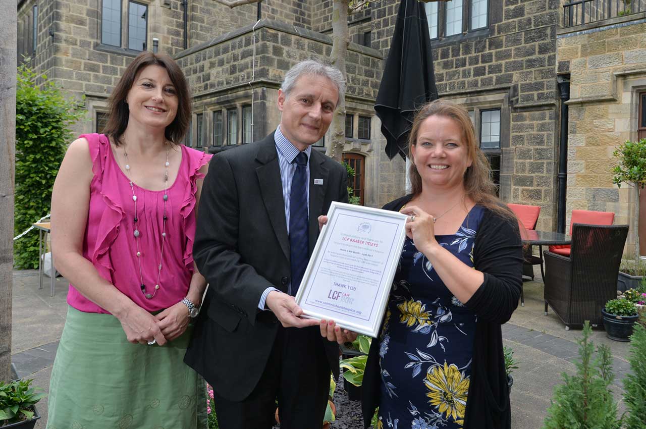 Helen Waterhouse and Mark Jones from LCF Barber Titleys with Emma Vanson from Saint Michael’s Hospice