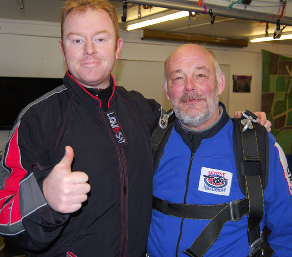 Peter Jones with his tandem skydive instructor 