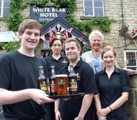 Ale Hands To The Pumps! White Bear Hotel General Manager Sue Thomas (second from right) with, from left Josh Waterton-Bailey, Sarah Pentith, John Goodyear and Sally Buckle, who are putting the finishing touches to the 11th Annual White Bear Hotel Beer Festival