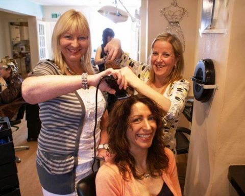 Hair Raising Charity Stunt! Amanda Grant (seated) with Kudos Colleagues Julie Peel (left) and Paula Nellis