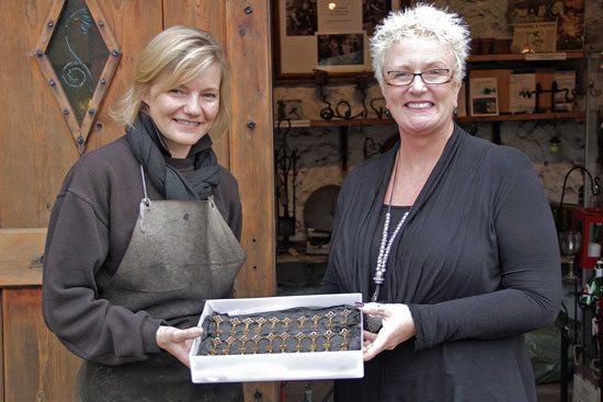 Annabelle Bradley presents Tina Catling with the first 30 keys