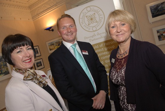 Selena Hinds and Jonathan Mortimer of Raworths with Christine Norton of Saint Michael's Hospice