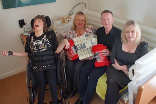 Claro Road Care Home service user Kaylie Atkinson, Yorkshire Linen Co Financial Director Linda Shreeve, Claro Road Care Home Residential Care Manager Steven Taylor and Disability Action Yorkshire Chief Executive Jackie Snape Claro Road Care Home service user Kaylie Atkinson, Yorkshire Linen Co Financial Director Linda Shreeve, Claro Road Care Home Residential Care Manager Steven Taylor and Disability Action Yorkshire Chief Executive Jackie Snape.