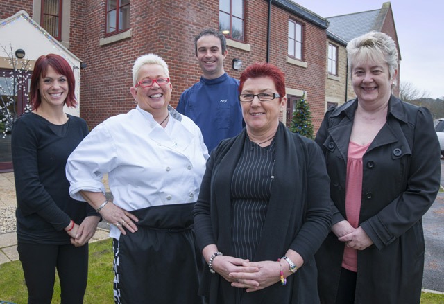 Jane Nixsen (front) with five of the new staff Jane Nixsen (front) with five of the new staff