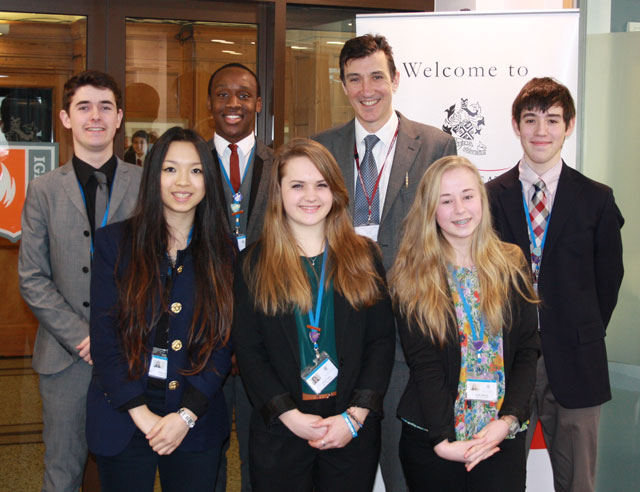 back row from left to right: Year 12 students, Will Eley, Carl Hassan, Headteacher Mr Richard Sheriff and Hugo Strauss Front row left to right: Year 12 students, Steph Wong, Jenny Visick and Emily Allanson