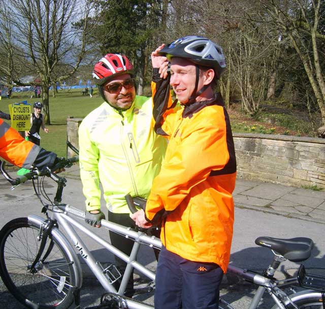 All smiles as they dismount from the tandem