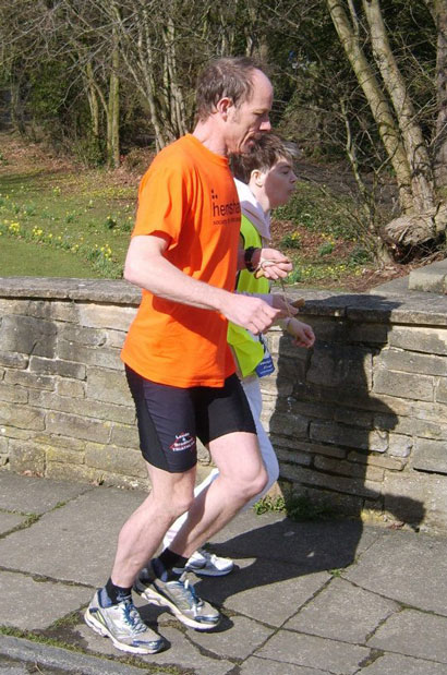 The final part of the event is the 5km run - here's Jennie setting off with Matt running alongside