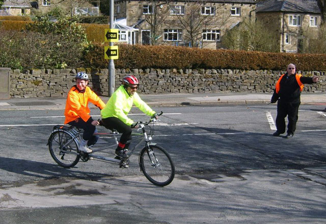 Samuel makes it round the final bend of the course, steered safely by Nick