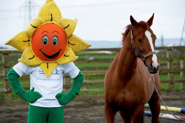 Under Starter’s Orders! Leo Group’s Sonny the Sunflower who is taking part in the Mascot Gold Cup