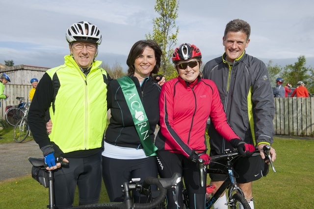Acorn Chairman Louise Hanen (second left) with cyclists Robert Le Blanc and Kieran Sykes and chief sponsor Tim Naughton of Lights4Fun