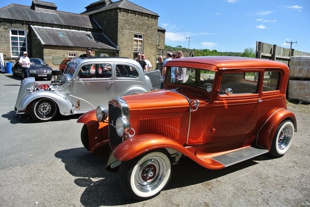 Bronze 1930s Ford Model A Victoria Coupe and Silver Metal Flake 1950s Ford Popular Bronze 1930s Ford Model A Victoria Coupe and Silver Metal Flake 1950s Ford Popular