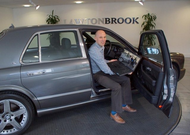  Major Investment! Lawton Brook’s John Hill demonstrates the show room’s cutting edge technology