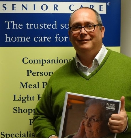 Andrew Van Parys with some of the Alzheimer’s training material used at the free family workshops