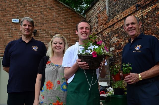 Photo taken at Henshaws Arts and Crafts Centre of the Lions handing over a cheque to help fund the replacement of a greenhouse destroyed in storms earlier this year. Left to right are Gordon Renton, Lions secretary, Maria Dawbarn, centre manager, student Alex Dennett, and incoming Lions' president Malcolm Jennings. Photo taken at Henshaws Arts and Crafts Centre of the Lions handing over a cheque to help fund the replacement of a greenhouse destroyed in storms earlier this year. Left to right are Gordon Renton, Lions secretary, Maria Dawbarn, centre manager, student Alex Dennett, and incoming Lions' president Malcolm Jennings.