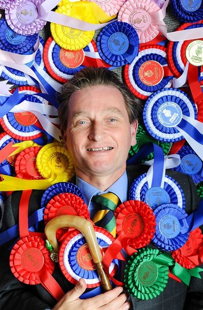 Nigel Pulling Chief Executive of the Yorkshire Agricultural Society, surrounded by rosettes in preparation for the start of this year’s Great Yorkshire Show